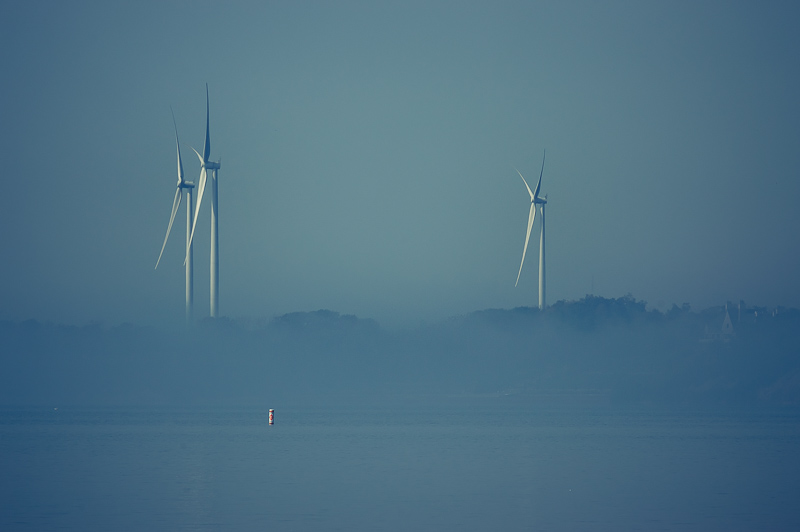 Wind turbines in the mist